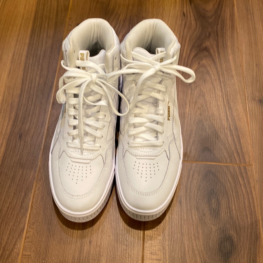 Boys shoes, white puma sneakers.